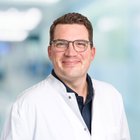 Dr. Julian Tank