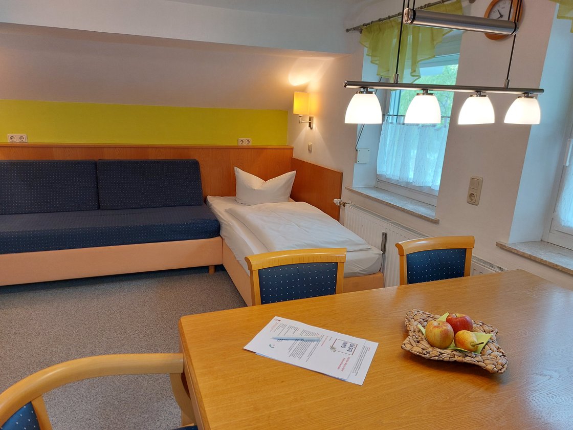 Der Schlafbereich in einer Ferienwohnung im Martha-Maria-Hotel Hohenschwangau.