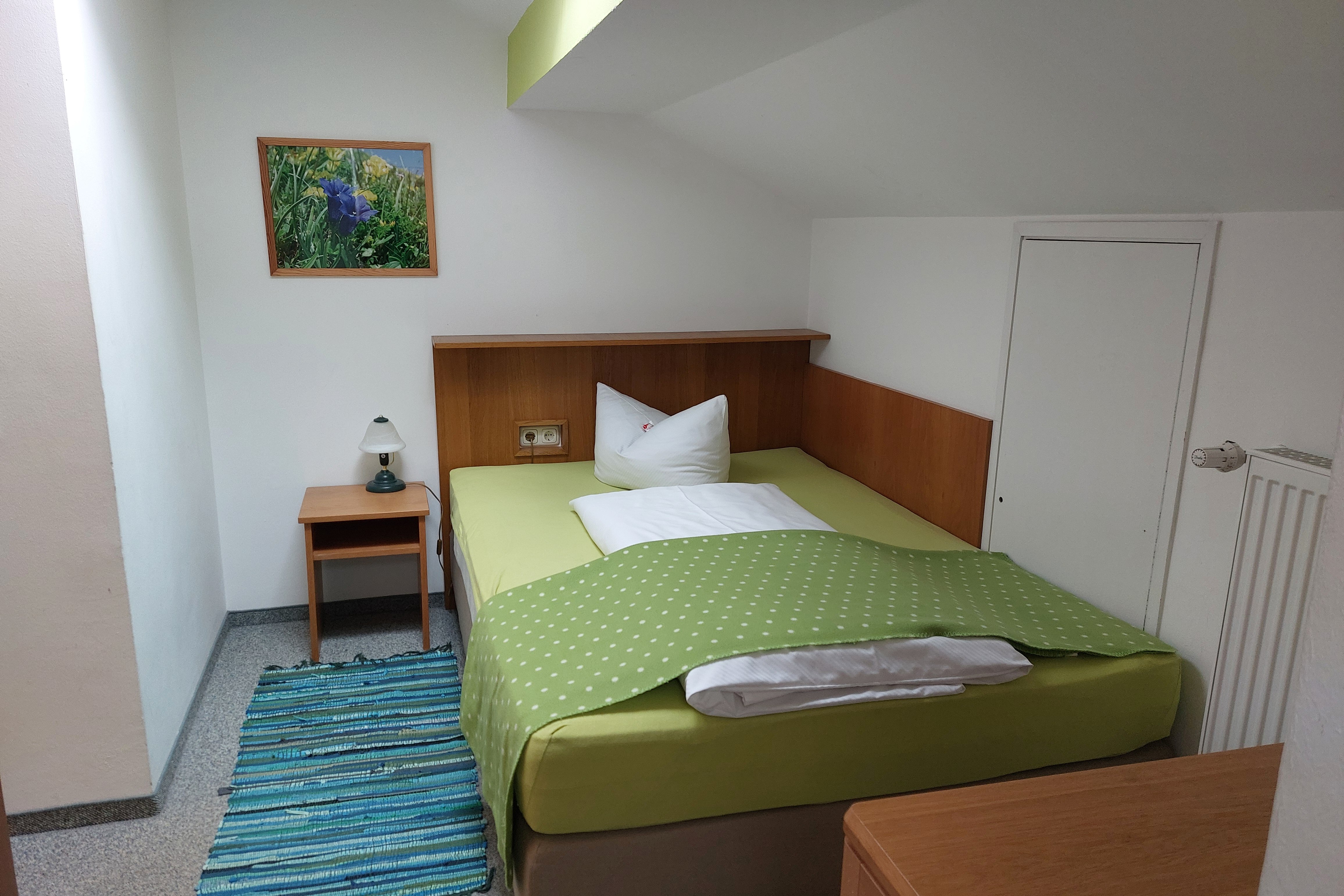 Der Schlafbereich in einer Ferienwohnung im Martha-Maria-Hotel Hohenschwangau.