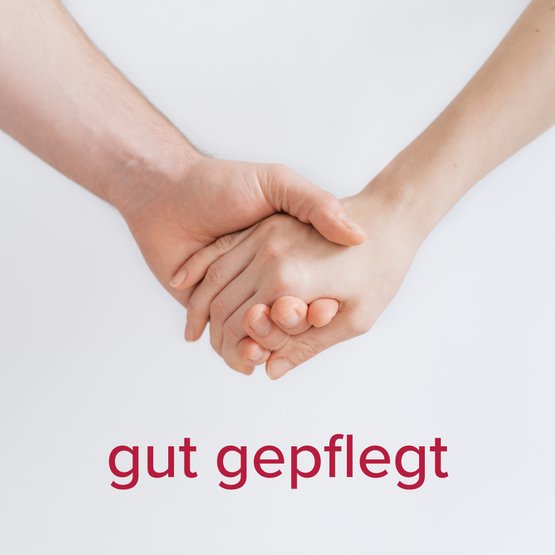 Mehrere Martha-Maria-Mitarbeiter machen ein Selfie, symbolisiert Teamgeist.