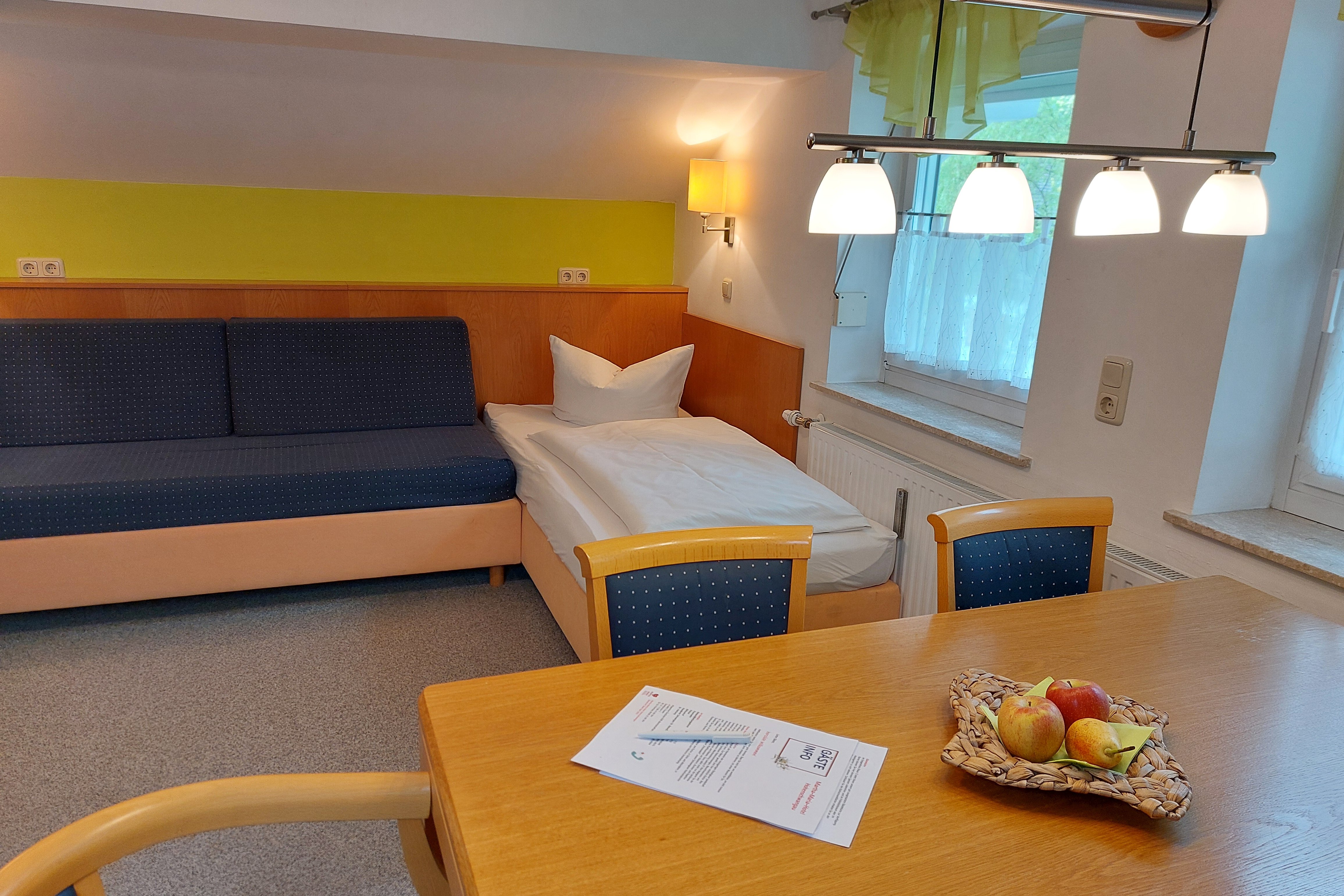 Der Schlafbereich in einer Ferienwohnung im Martha-Maria-Hotel Hohenschwangau.